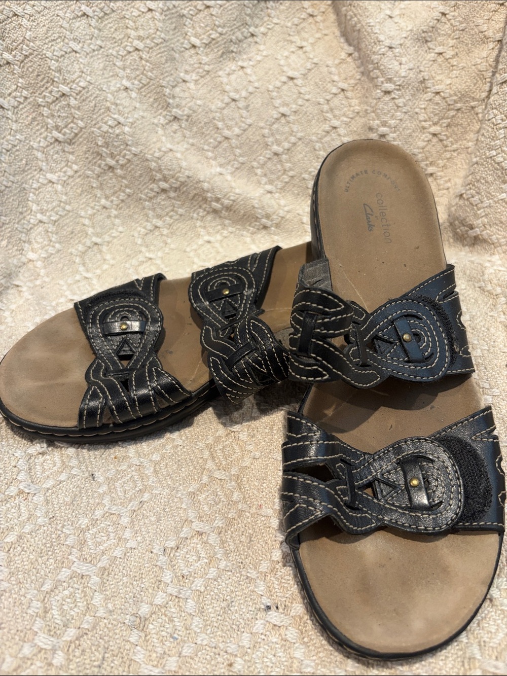 Clarks Black Leather Slip-On Sandals with Decorative Stitching